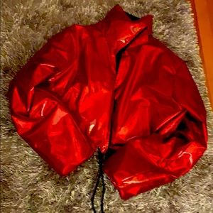 Shiny red glossy jacket oversized sleeves